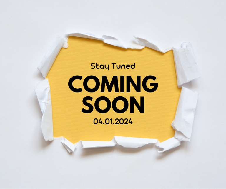 paper ripping to reveal the text " stay tuned, coming soon"